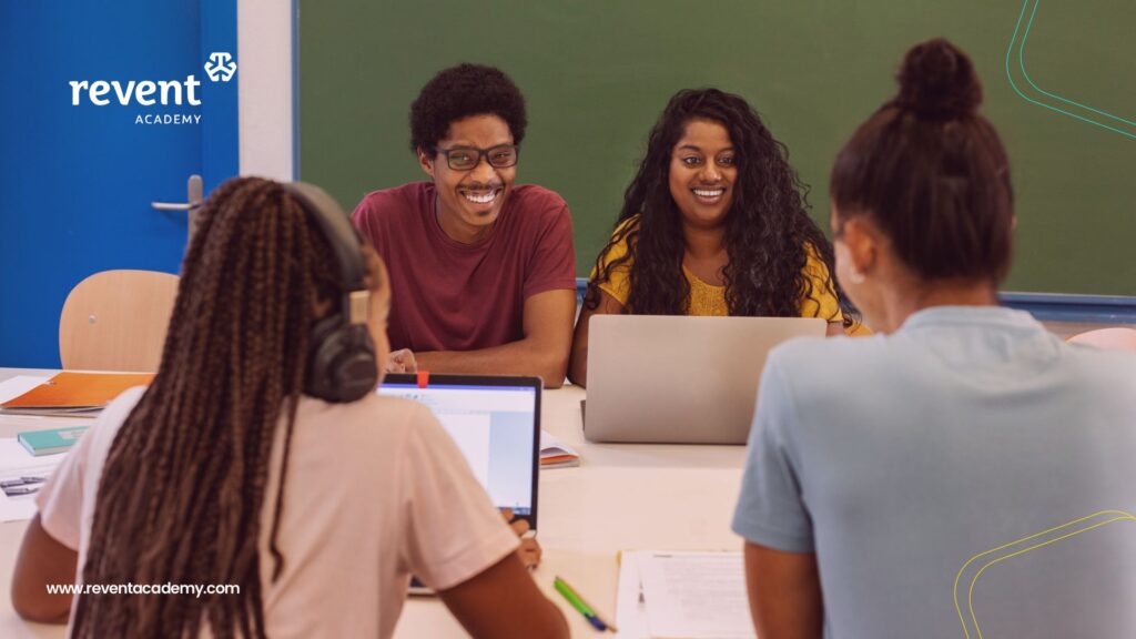 An image showing 4 students. two womenand two men